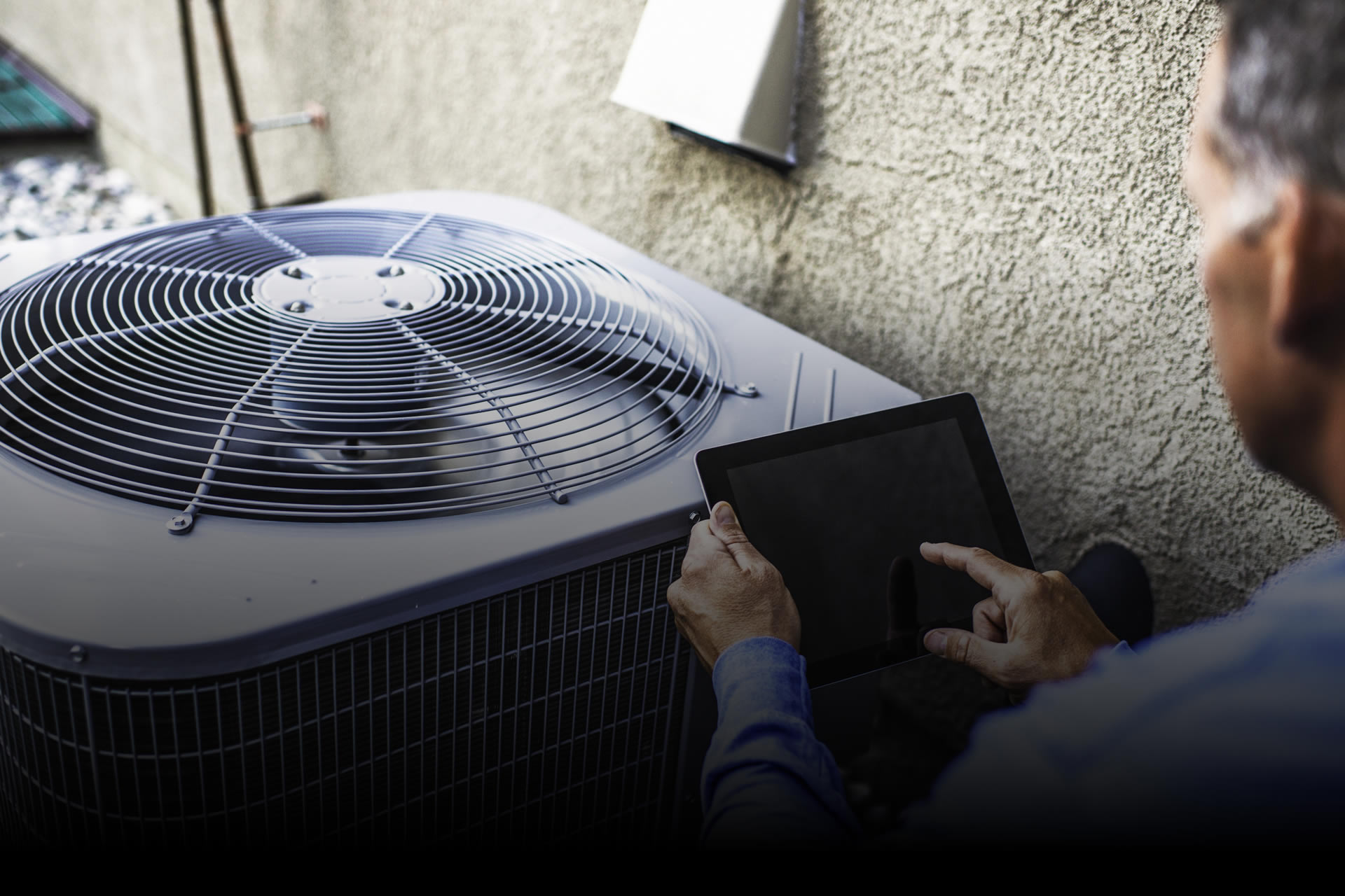 Man checking HVAC system